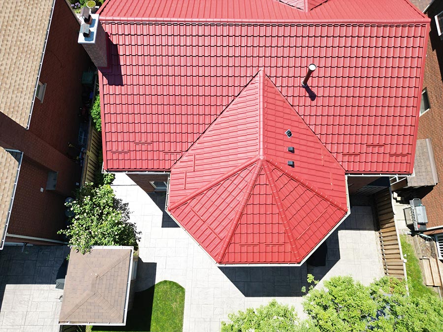 Metal roof replacement in Oakville with Enigma profile in red