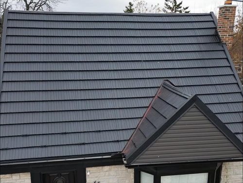 Metal roof replacement in Hamilton with Black Janosik metal shingles