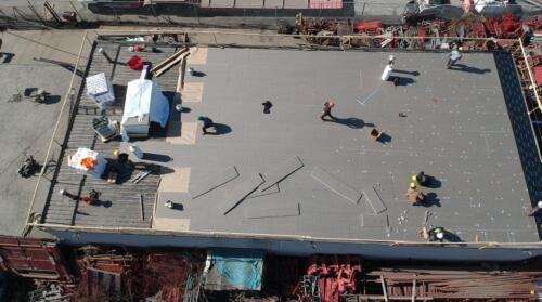 Commercial flat roof replacement with 2-ply modified bitumen