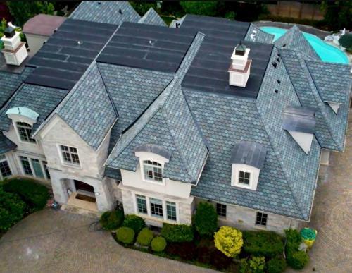 Oakville roof replacement with designer shingles on sloped roof section